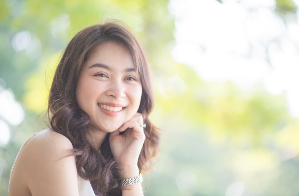 smiling young woman with white teeth